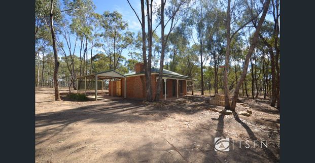 Located in a lovely quiet bush setting - Photo 1