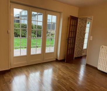 A HOLNON PAVILLON SEMI MITOYEN 3 CHAMBRES JARDIN ET GARAGE - Photo 1