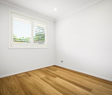 Freshly Renovated Home with Modern Style & Spacious Yard - Photo 2