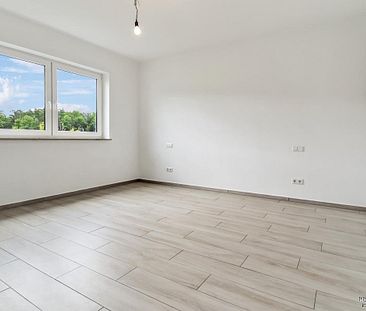 Moderne und großzügige Wohnung mit Einbauküche und Süd-Balkon - Foto 6