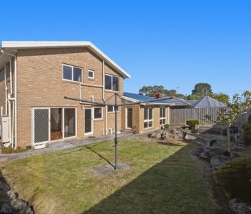 Renovated Comfort with Multiple Living Zones for the Family - Photo 1