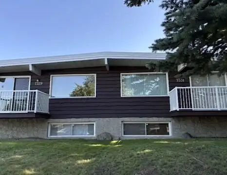 Large 4 bedroom duplex | 7331 - 7329 Huntertown Crescent Northwest, Calgary - Photo 1