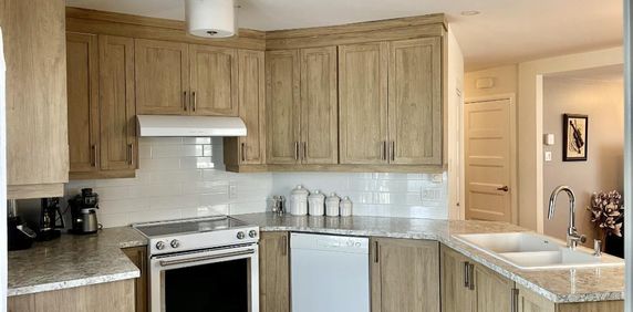 Grand 5 ½ rénové – Style condo – Fabreville – 1er étage Triplex – 1950 $/mois - Photo 2