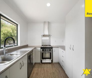 Charming 3-Bedroom Home with Decking in Handy Henderson Location - Photo 5