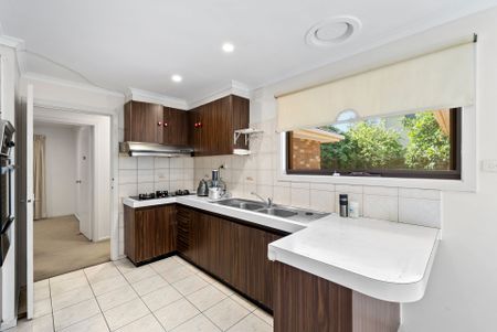 Spacious Four-Bedroom Home with Gardening Included - Photo 3