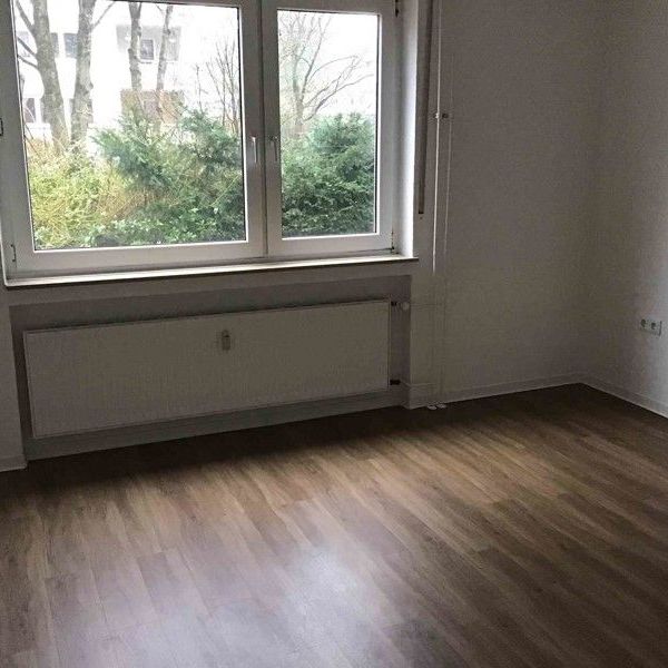 Familienwohnung im Erdgeschoss mit schönem Balkon! - Foto 1