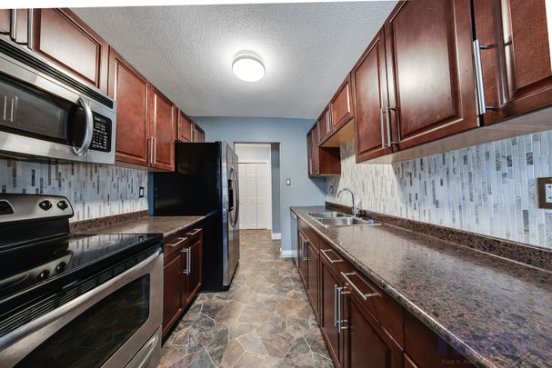 Exhibition - 2 Bedroom Condo - 2106 St. Cecilia Ave - Photo 1