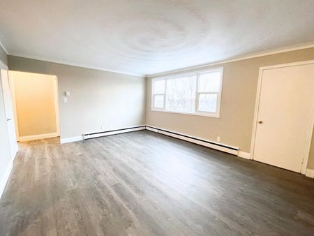 Breton Place Apartments - PARKING SPACE, WATER & HEAT INCLUDED - Photo 2