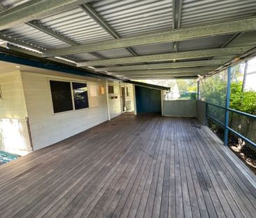 Neat Three Bedroom Home with Shed Plus Huge Deck - Photo 1