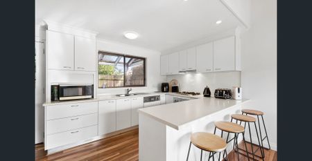 Charming Two-Bedroom Renovated Home in Old Ocean Grove - Photo 4