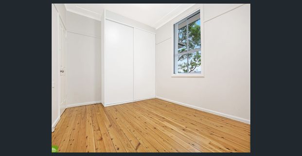 Renovated Home with Lawn Maintenance Included! - Photo 1