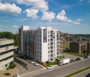 The Topaz Laval Apartments | 1555 boul. Laval, Laval - Photo 1