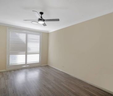 COMFORTABLE HOME INCLUDES SOLAR PANELS !!! - Photo 4