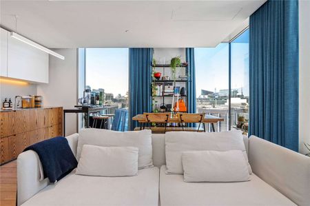 A top floor two bedroom apartment with stunning views in the Barts Square development. - Photo 4