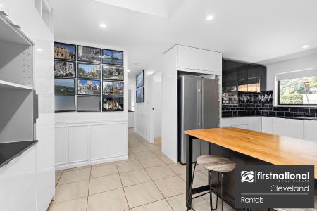 Modern Lowset Family Home with Side Access + Large Shed - Photo 4