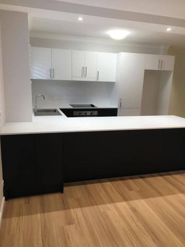 NEWLY RENOVATED 2 BEDROOM UNIT - Photo 3