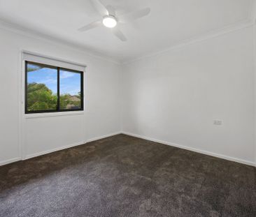 Freshly Renovated Coastal Home - Lawn Maintenance Included - Photo 3