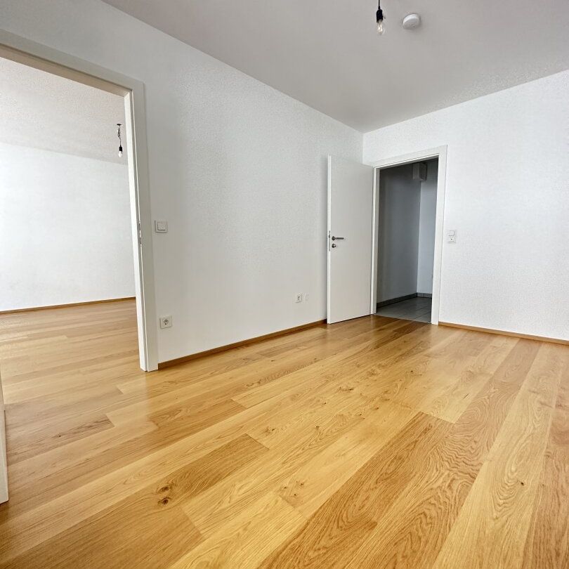 Top Wohnung mit Balkon in direkter Stadtnähe bei der U6! - Foto 1