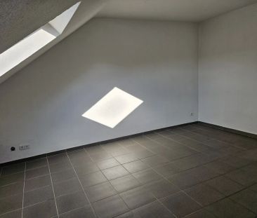 Moderne Dachgeschosswohnung in ruhiger Lage - Photo 2