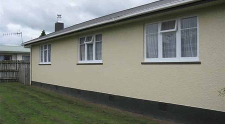 Spacious 3-Bedroom Home with Fenced Yard & Great Living Spaces - Photo 2
