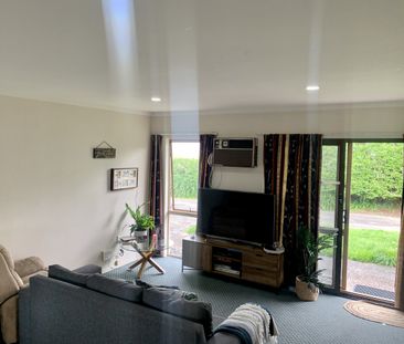 Tidy modern three bedroom unit, one of two. - Photo 2