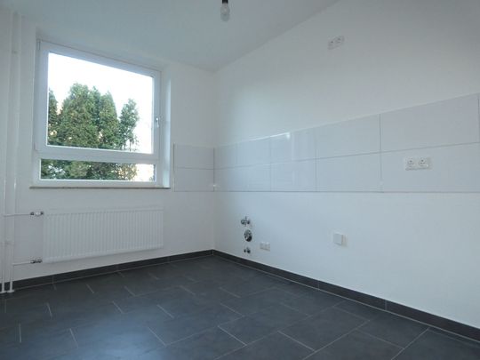 *** Das wird Ihnen gefallen! Modernisierte EG-Wohnung in grüner Lage! *** - Photo 1