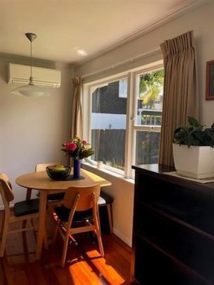 Sunny, fully fenced home - Photo 1