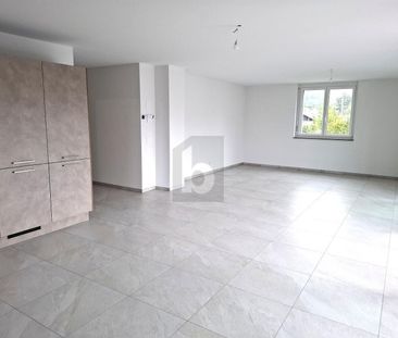 NEW, SPACIOUS AND MODERN - Photo 1