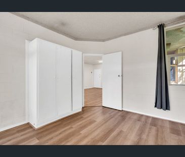 Low Maintenance Unit in Prime Location - Photo 1