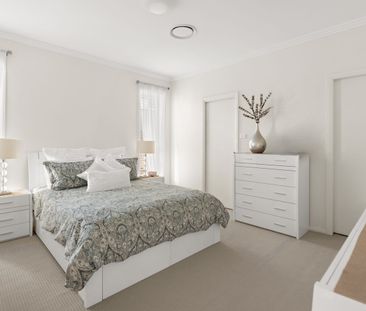 Contemporary Family Home with Expansive Living Spaces and Outdoor O... - Photo 6