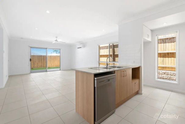 “Affordable, new home in a quiet, family-friendly residential neighbourhood.” - Photo 1