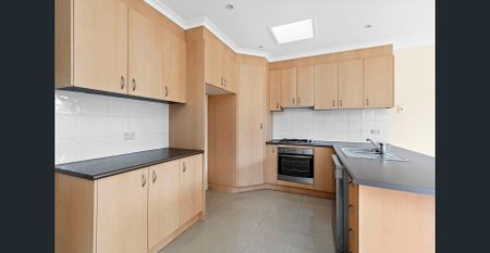 Sunny, Stylish & Superbly Located Single-Level Living - Photo 3