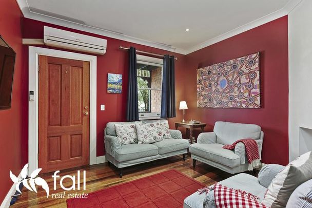 Fully Furnished Charming Character Townhouse - Photo 1