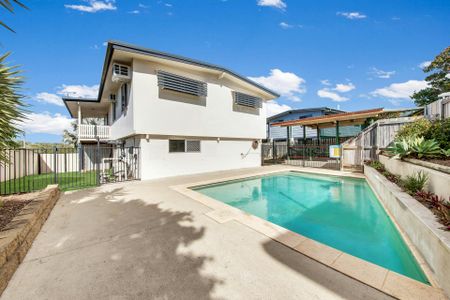 Spacious Family Home with Pool and plenty of Storage - Photo 3