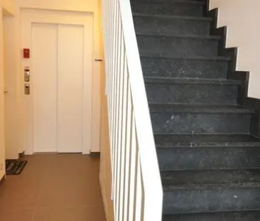 Ruim duplex appartement met terras en autostaanplaats - Photo 6