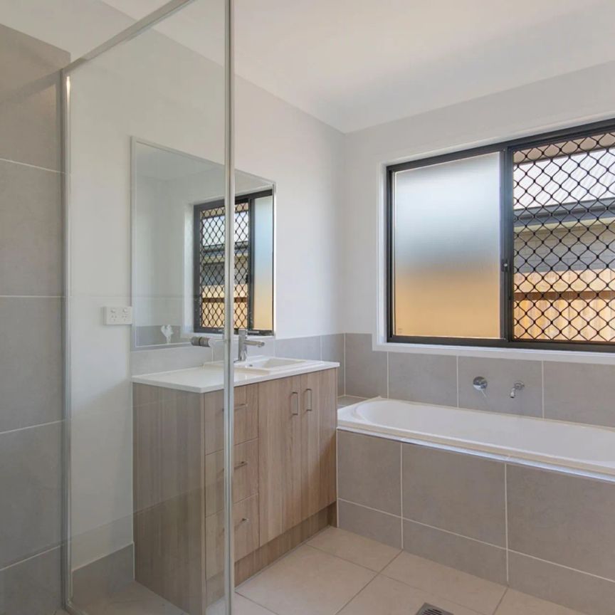 A modern sanctuary in a peaceful, family-friendly pocket, this beautifully finished 4-bedroom home delivers effortless living with a touch of luxury. - Photo 1