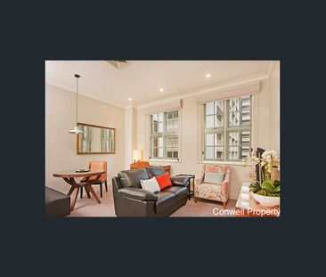 RENOVATED 1 BEDROOM FULLY FURNISHED TOP FLOOR CBD HERITAGE APARTMENT - Photo 1