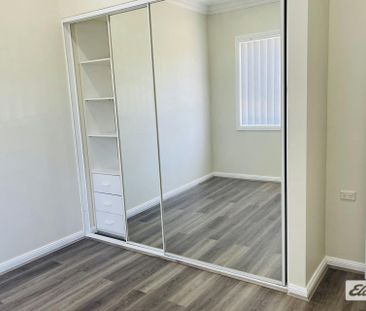 Mordenised Family Home in Bankstown with freshly painted - Photo 4