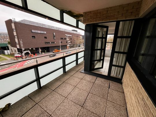 Tweeslaapkamerappartement met staanplaats in centrum Genk. - Foto 1