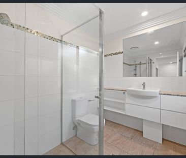 Private Pool & Huge Covered Entertaining – Spacious 3-Bedroom Townh... - Photo 6