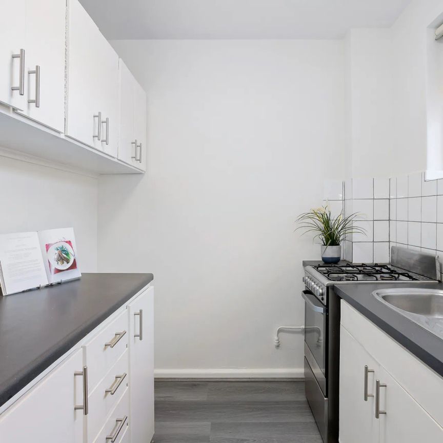 Spacious and sunlit in a sought-after street - Photo 1