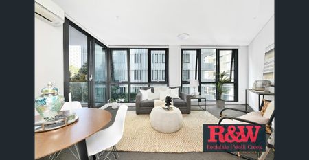 Modern 1-Bedroom Apartment in the Heart of Discovery Point - Photo 2