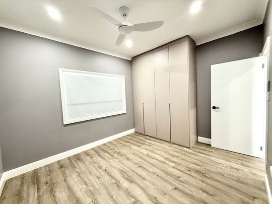 Fully Renovated Three-Bedroom Home with Carport Parking - Photo 1