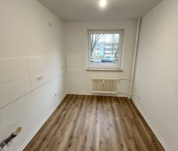 Tolle Erdgeschosswohnung mit Balkon - Foto 4