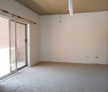 Two Bedroom Unit with Garage - Photo 3