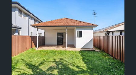 4-Bedroom Family Home with Modern Comforts and Expansive Outdoor Spaces - Photo 3