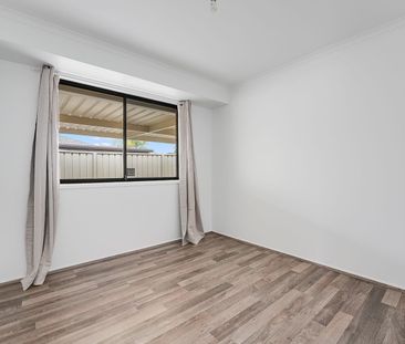 Four Bedroom Home with Spacious Entertaining Area - Photo 1