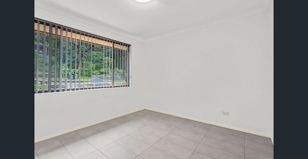 Renovated Dual-Level Home Perfect for Families in a Prime Location - Photo 1