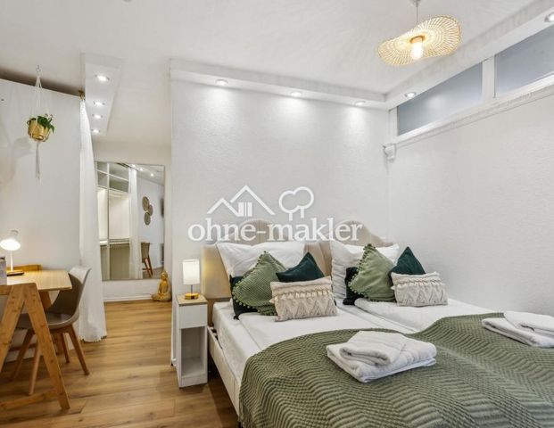 hochwertig möblierte Wohnung - Foto 1