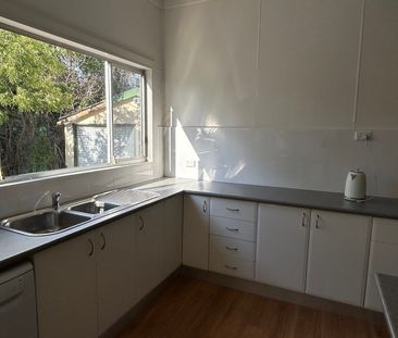 Renovated home close to everything! - Photo 1